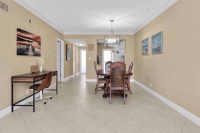 dining space featuring visible vents, baseboards, ornamental molding, and a chandelier