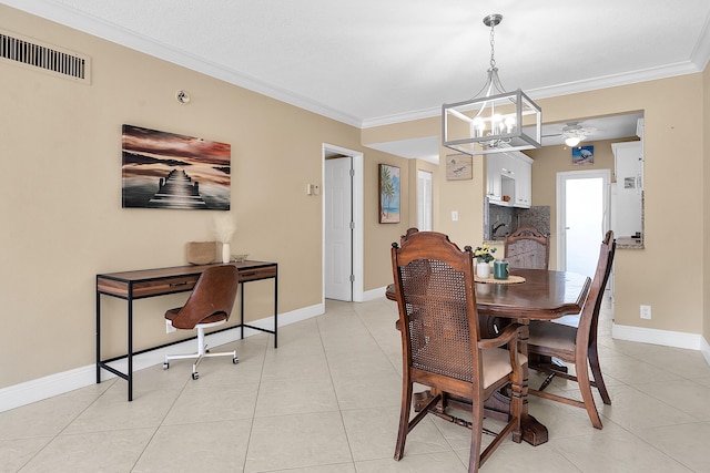 dining space featuring visible vents, crown molding, baseboards, light tile patterned floors, and ceiling fan with notable chandelier