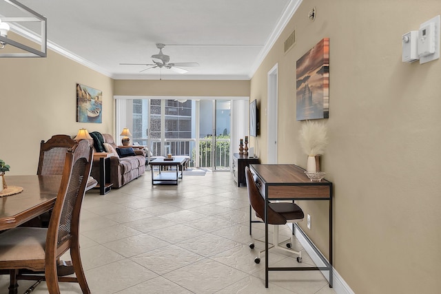 interior space featuring visible vents, baseboards, a ceiling fan, and ornamental molding