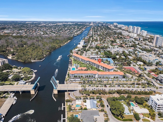 birds eye view of property featuring a water view