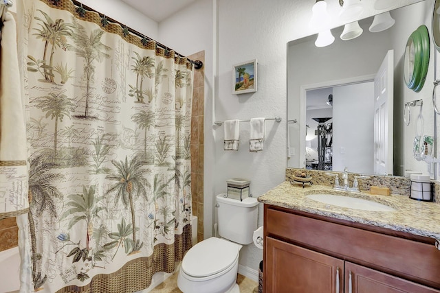 full bathroom featuring a textured wall, vanity, toilet, and shower / bathtub combination with curtain