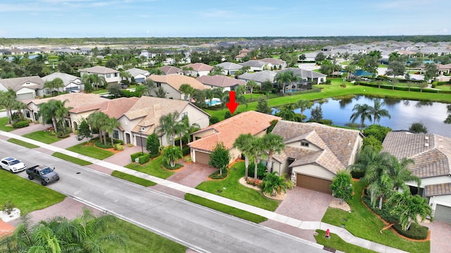 aerial view with a water view and a residential view