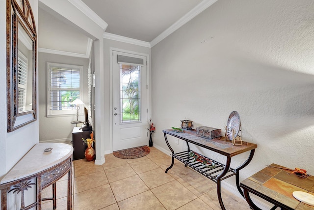 entrance foyer featuring light tile patterned floors, baseboards, ornamental molding, and a textured wall