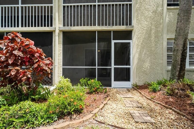 exterior space featuring stucco siding