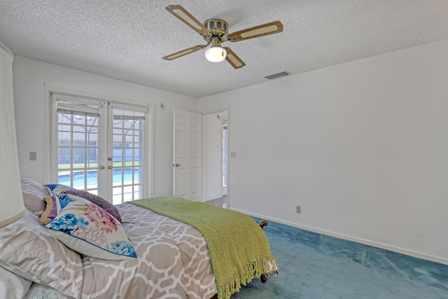 bedroom featuring visible vents, access to outside, a textured ceiling, french doors, and carpet