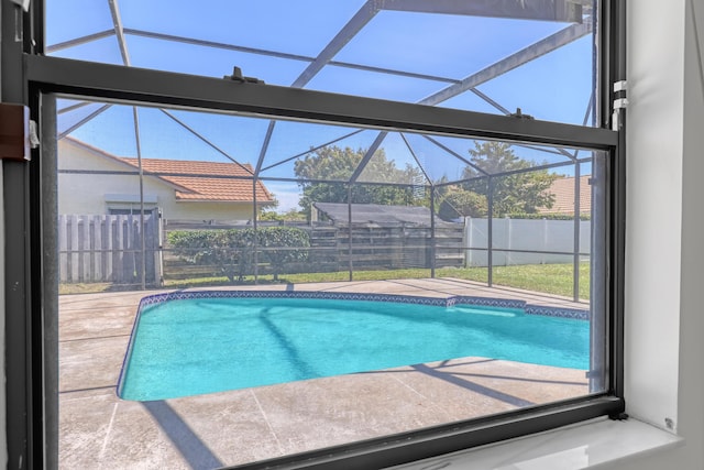 view of swimming pool featuring a fenced in pool