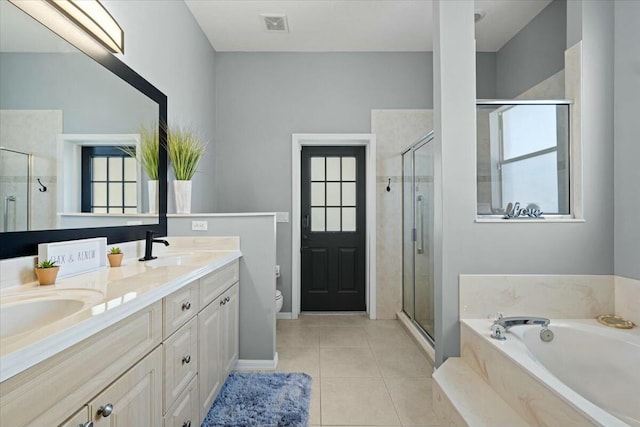 full bathroom with a shower stall, visible vents, and a sink