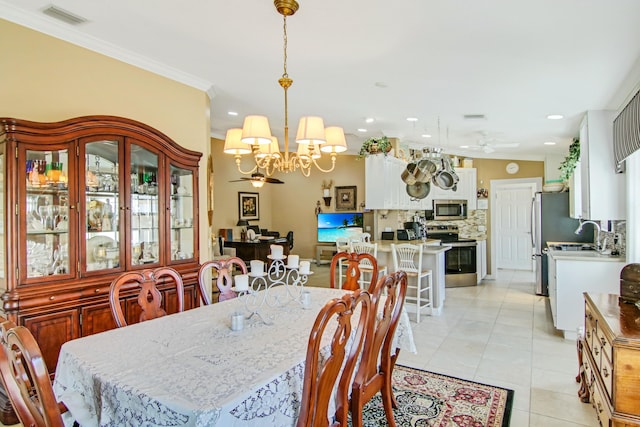 dining room featuring light tile patterned floors, visible vents, ceiling fan with notable chandelier, crown molding, and recessed lighting