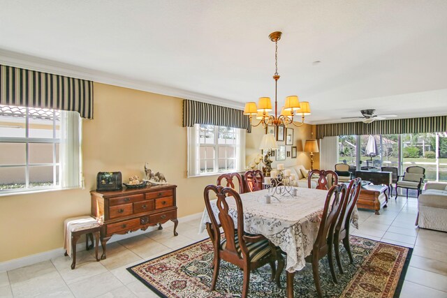 dining area with baseboards, light tile patterned floors, and a healthy amount of sunlight