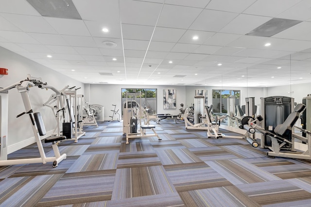 gym with carpet floors, baseboards, and recessed lighting