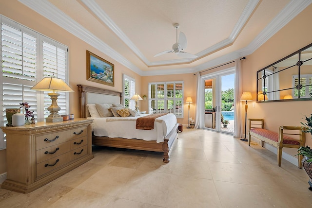 bedroom with light tile patterned floors, access to outside, a tray ceiling, crown molding, and french doors