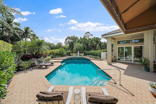 view of pool featuring a fenced in pool and a patio area