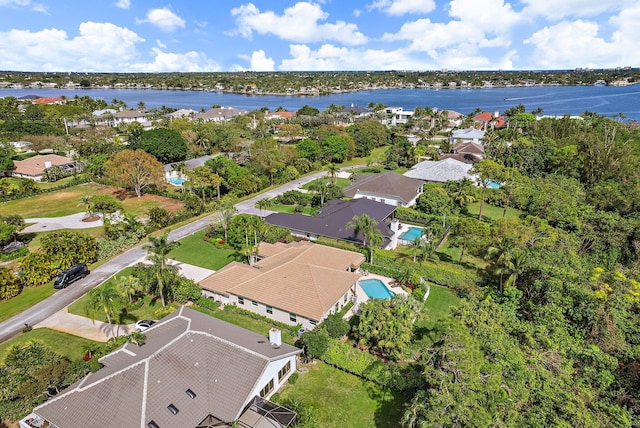 bird's eye view with a water view and a residential view