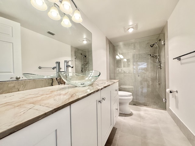 full bath featuring visible vents, a shower stall, toilet, and vanity