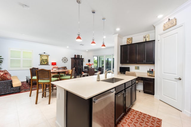 kitchen with crown molding, decorative light fixtures, light countertops, stainless steel dishwasher, and a sink