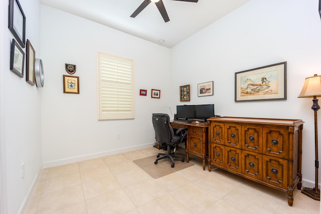 home office featuring baseboards, light tile patterned flooring, and a ceiling fan