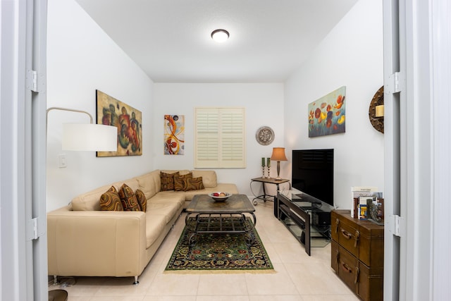 living area featuring light tile patterned floors