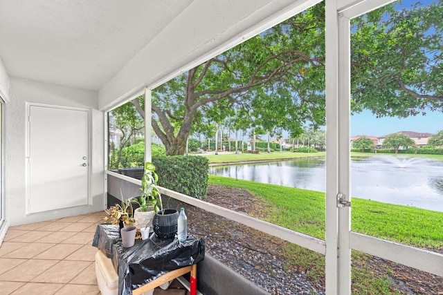 sunroom with a water view