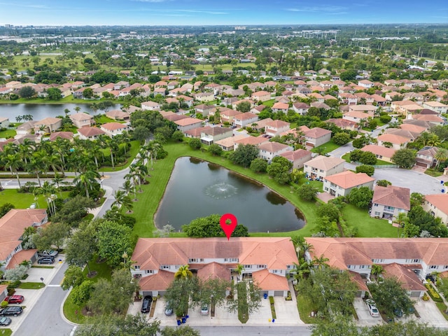 aerial view featuring a water view and a residential view