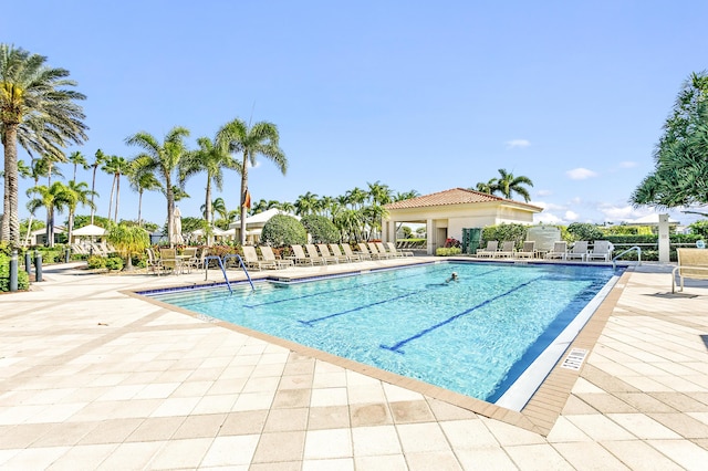 pool with a patio