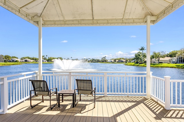 wooden terrace with a water view