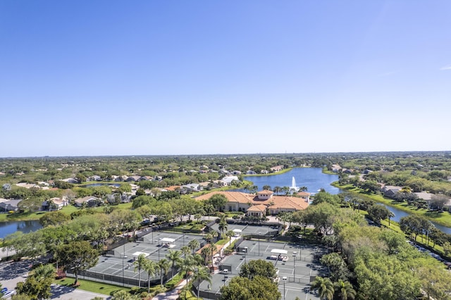 birds eye view of property featuring a water view and a residential view