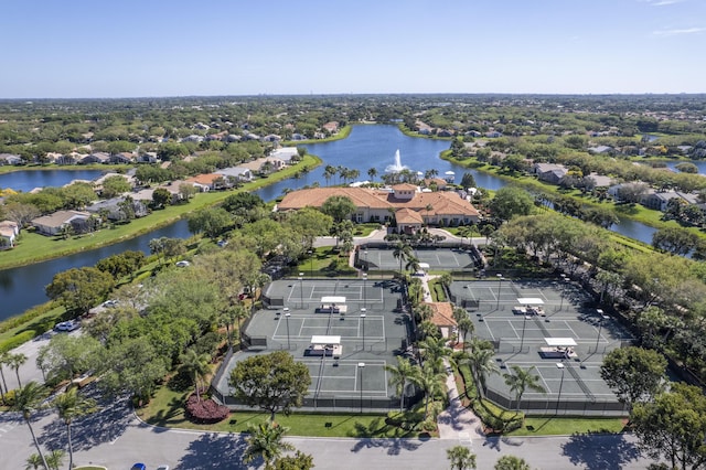 drone / aerial view featuring a water view and a residential view