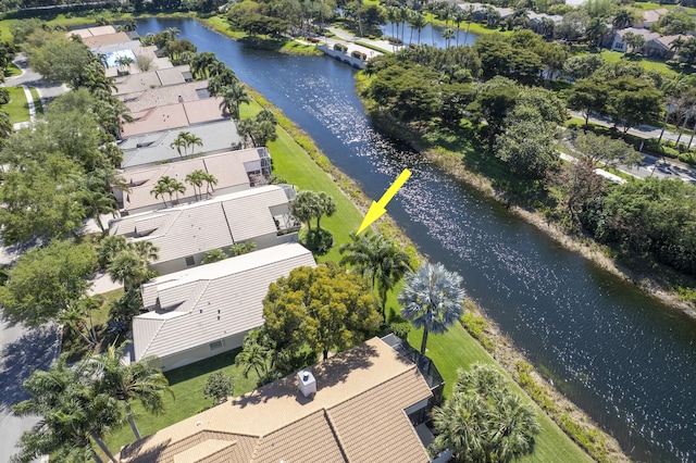 bird's eye view with a water view and a residential view