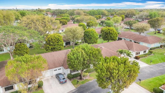 birds eye view of property with a residential view