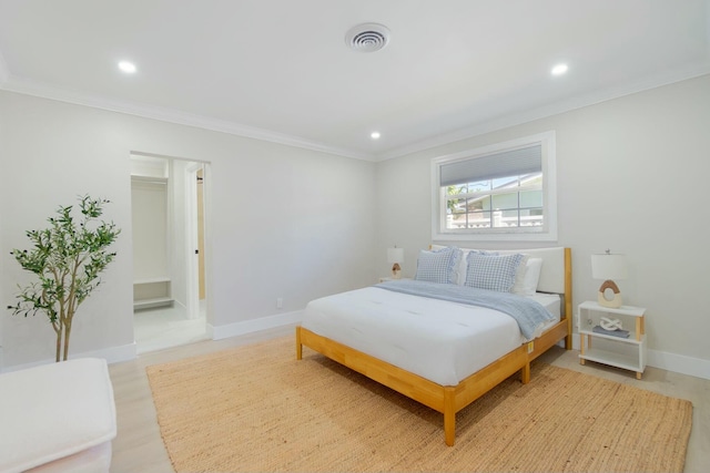 bedroom featuring visible vents, crown molding, and baseboards