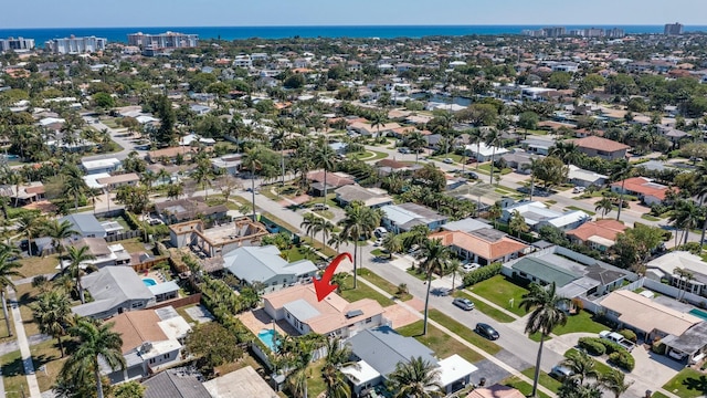 aerial view with a water view and a residential view