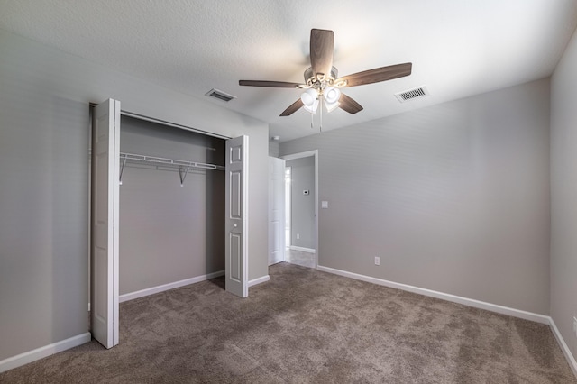 unfurnished bedroom featuring a closet, visible vents, baseboards, and carpet flooring