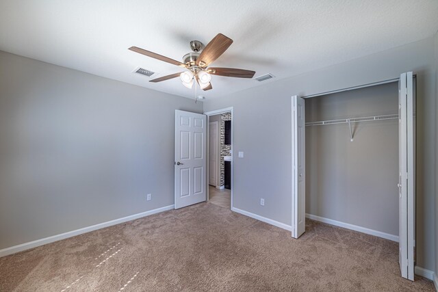 garage with water heater, electric panel, and a garage door opener