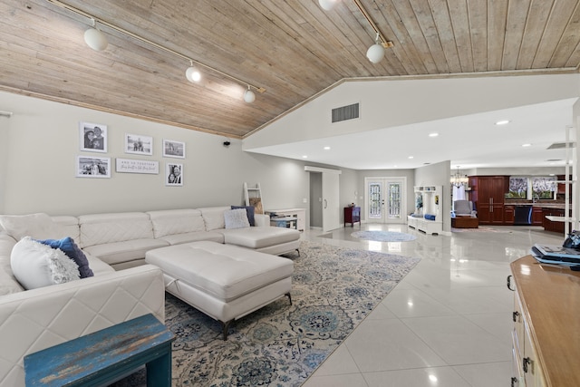 living room with light tile patterned floors, french doors, wooden ceiling, and rail lighting