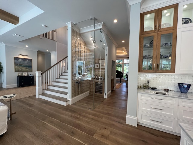 foyer with stairway, visible vents, recessed lighting, dark wood-style flooring, and crown molding