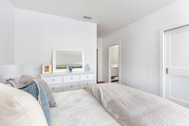 bedroom featuring visible vents