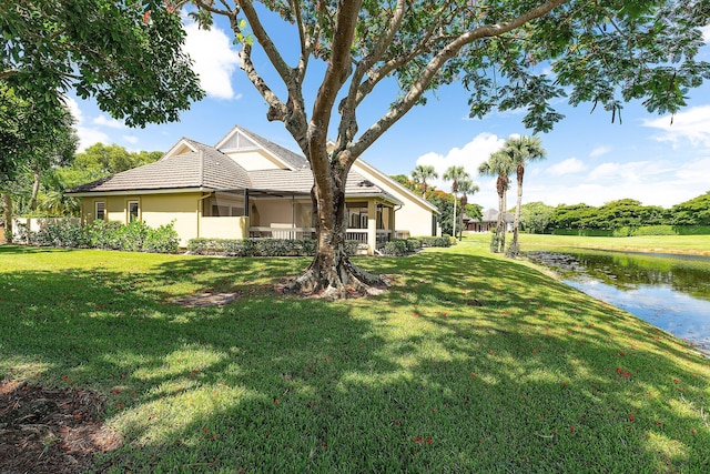 view of yard with a water view