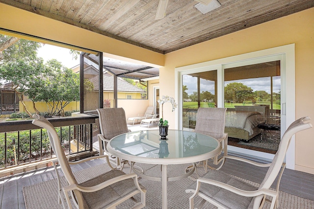 sunroom with wooden ceiling