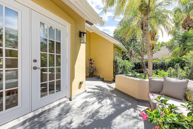 balcony featuring french doors