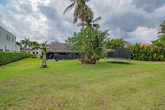 view of yard featuring a trampoline