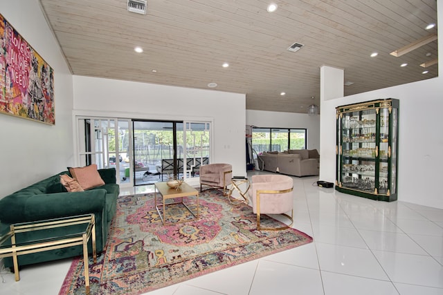 tiled living room with recessed lighting, visible vents, high vaulted ceiling, and wooden ceiling