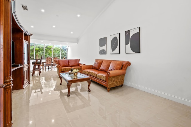 living area with lofted ceiling, recessed lighting, visible vents, ornamental molding, and baseboards