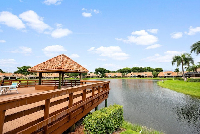 dock area with a gazebo and a water view