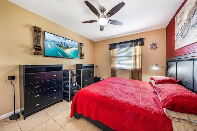 bedroom with tile patterned floors and ceiling fan