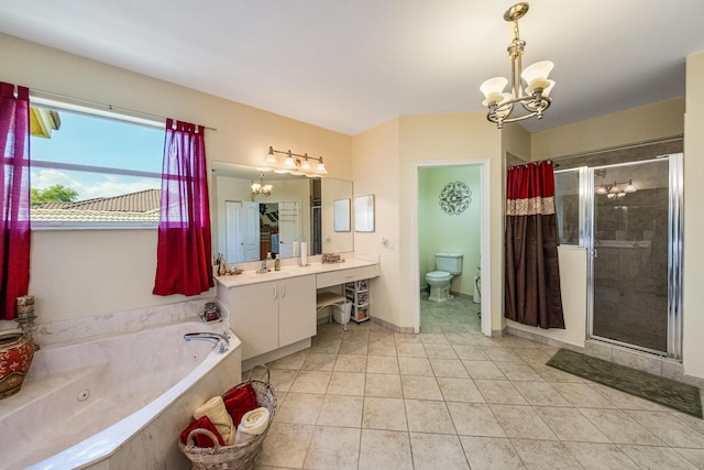 bathroom with a notable chandelier, a stall shower, toilet, and a whirlpool tub