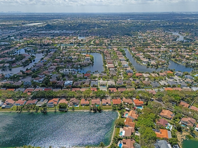 aerial view with a residential view and a water view