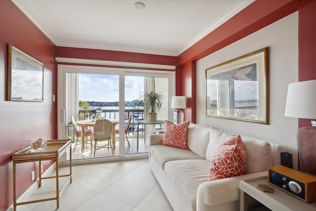 living room with a water view, crown molding, and light tile patterned floors