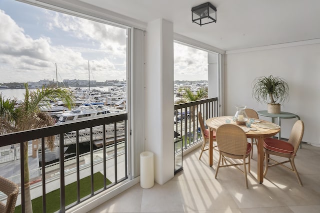 balcony featuring a water view