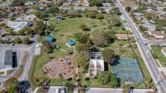 birds eye view of property with a residential view