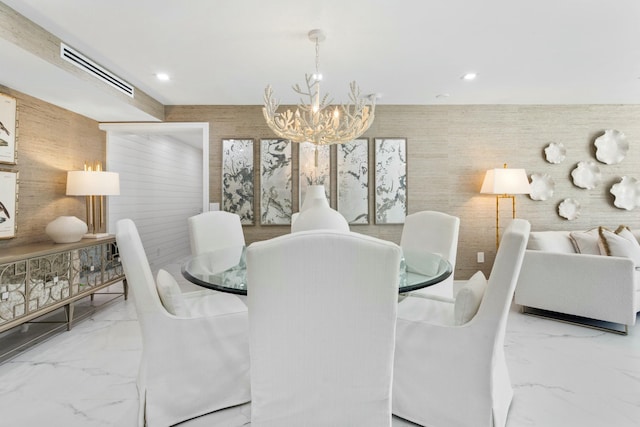 dining space featuring recessed lighting, visible vents, marble finish floor, and a chandelier